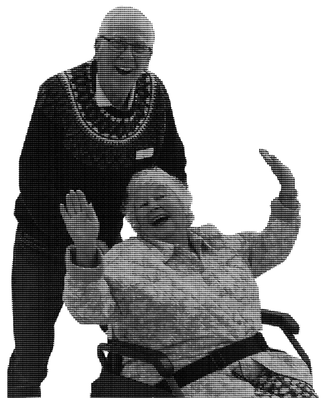 Two people share a joyful moment, one standing behind the other, who is seated in a wheelchair. The seated person is waving enthusiastically, while the standing individual smiles warmly.