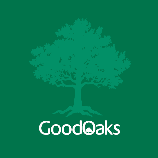 A stylized green tree with a thick trunk and sprawling branches above the text "GoodOaks" in a modern font. The background is a solid green color.