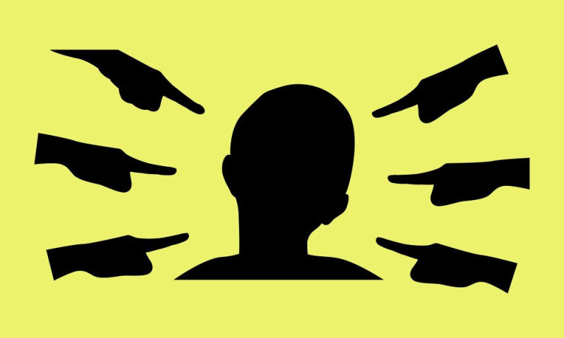 A silhouette of a head surrounded by multiple hands pointing towards it on a bright yellow background.