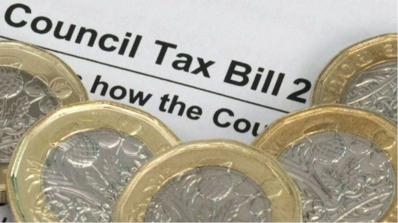 A Council Tax bill with several coins in the foreground. The bill includes the title "Council Tax Bill" at the top.