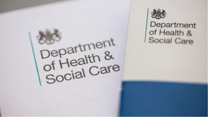 Two brochures or documents featuring the logo and branding of the Department of Health and Social Care. One document is predominantly white with a teal accent, and the other has a blue section at the bottom.